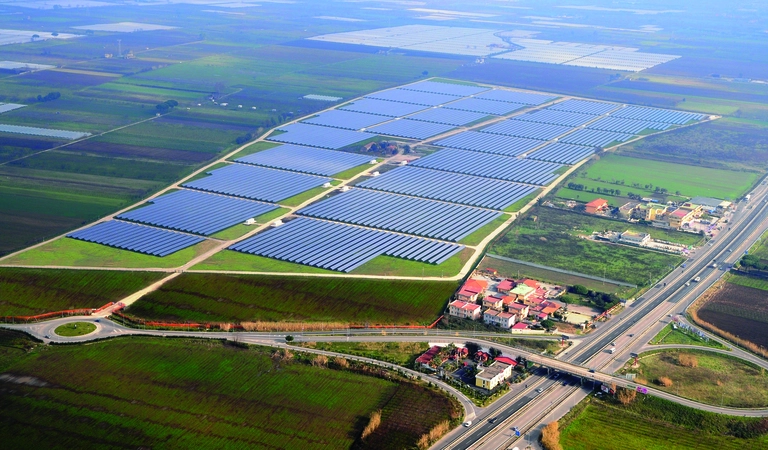 Aerial view of a multi-megawatt utility-scale solar farm